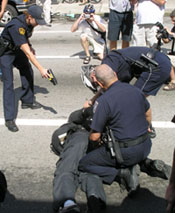 Taser, Dogs, and Chemical Weapons Used on Protesters