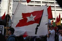 A Bucket of Water Thrown at the table of Revolution Books Damaging Books and Leaflets