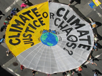 Climate Justice Boxer & Chevron Action